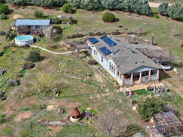 Aerial view showing the pool and the trailer