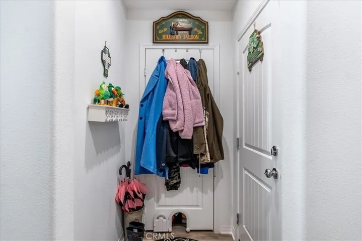 Garage entry and downstairs coat closet