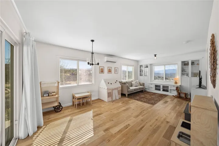 The Attached, Permitted Secondary Home Offers Its  Living Room