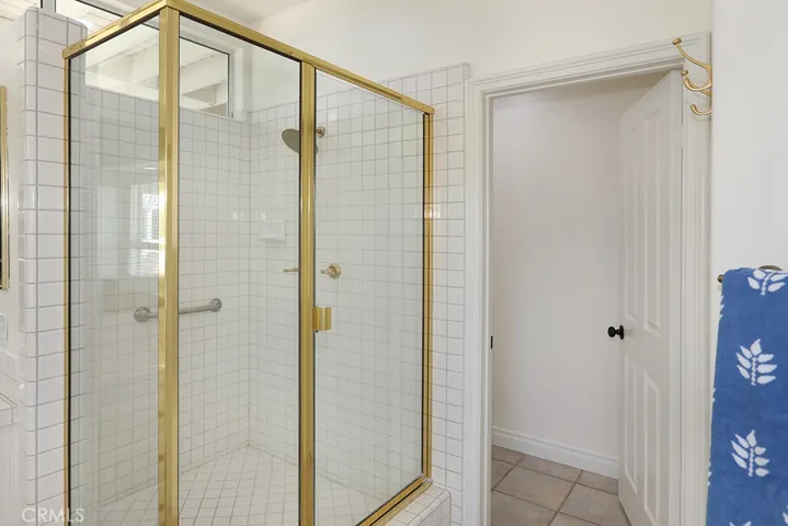 Primary bedroom shower and toilet closet