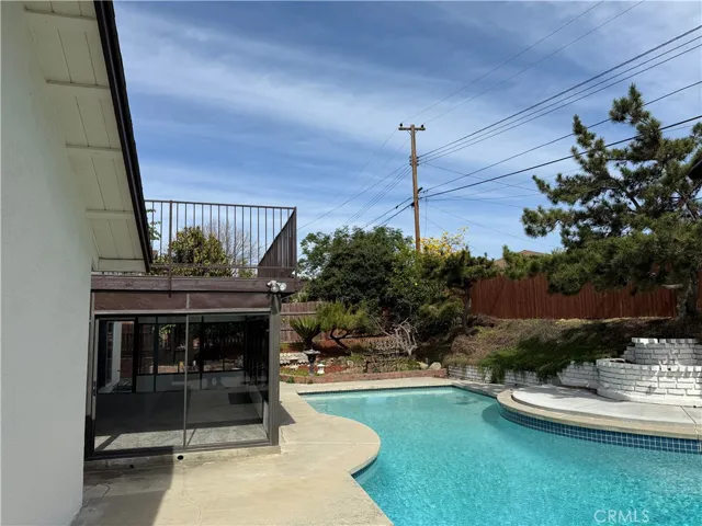 Backyard Pool and Sunroom