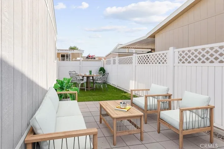 Nice yard over sized lot with vinyl fence all around for privacy. 3 Car parking & Shed. Staged photo