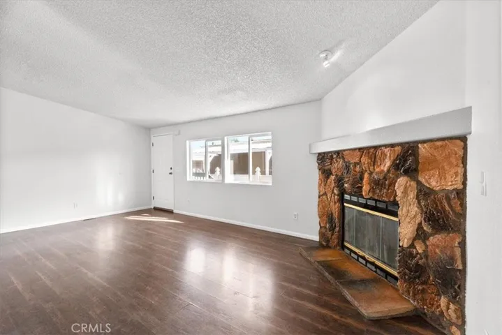 Kitchen and living area Fireplace new ceiling fans