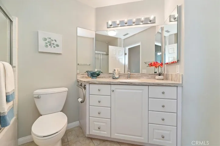 Guest bathroom with solid surface countertop
