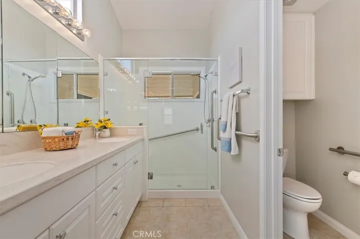Primary bathroom with custom shower surround