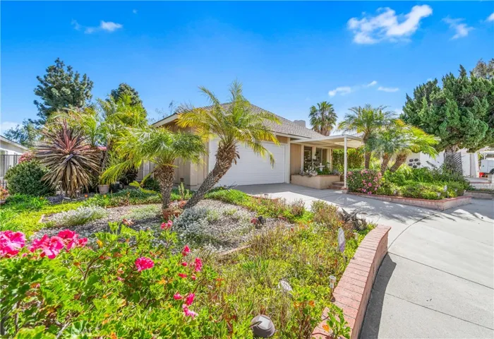 Lush landscaping abounds at 1688 ClayHill!  A gardener's dream, while still low maintenance....