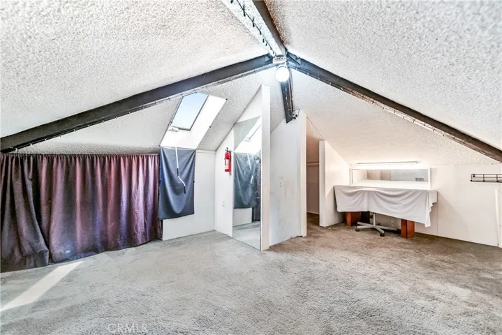Bonus room upstairs in the garage. (un-permitted but used as a bedroom by the owners)