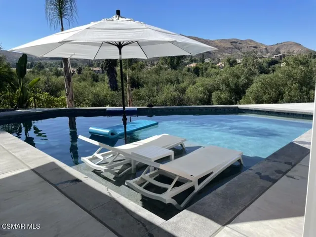 Maxine summer poolside