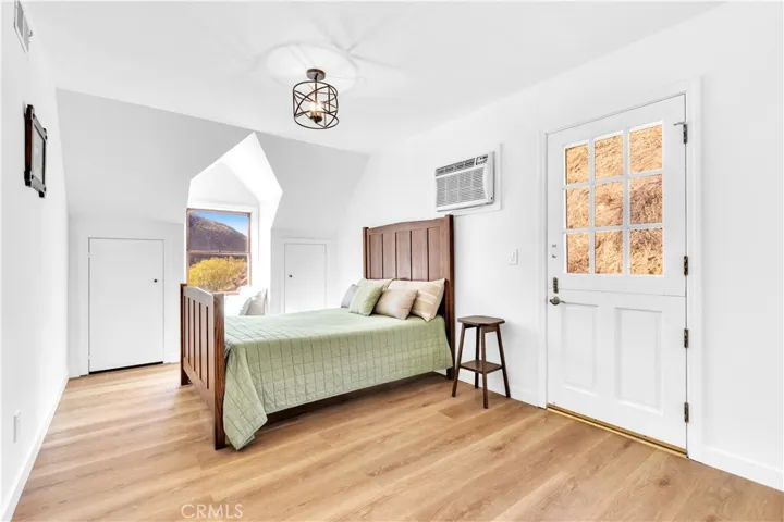 This bedroom has the same storage as the other but there is an entrance to the upstairs patio for additional lounging