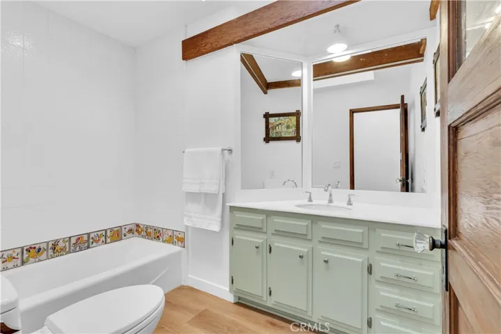 This cute bathroom serves the two adjacent bedrooms upstairs