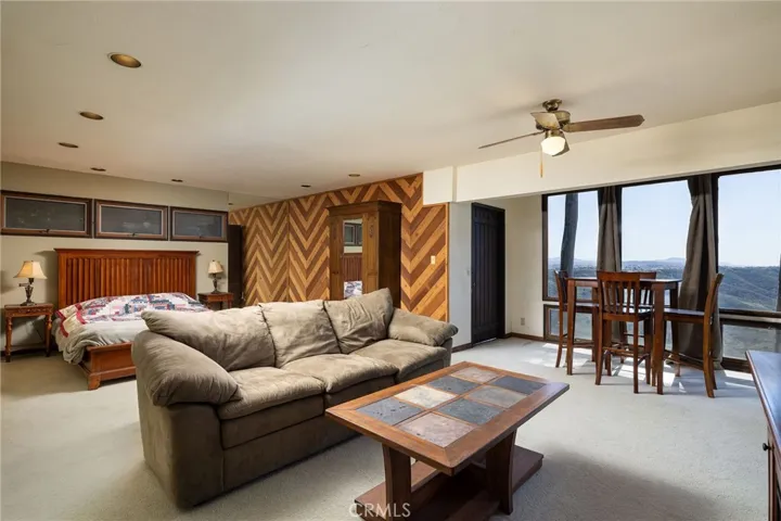 The lowest level of the home features a 1-bed, 1/2-bath suite that can be accessed via a private entry on the side of the home or from within the property.
