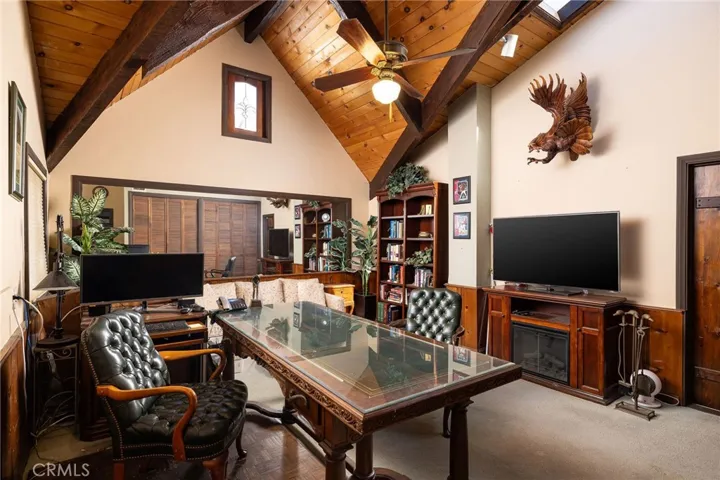 Second garage has been converted to executive office with direct, separate access from the property's entryway or from within the home.  A convenient 1/2 bath is adjacent.