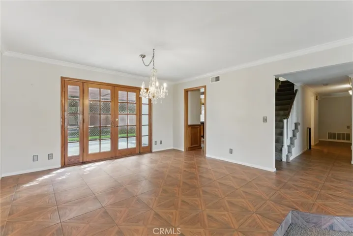 Formal Dining Room with French doors off of the patio. Great for entertaining