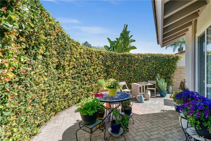 Gated front/side wrap-around patio