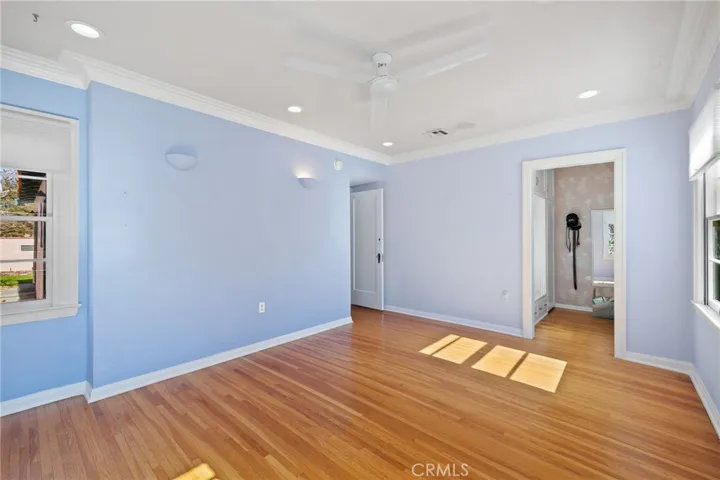 Middle Bedroom: opposite view, large walk-in closet with built-in cabinets & drawers.

