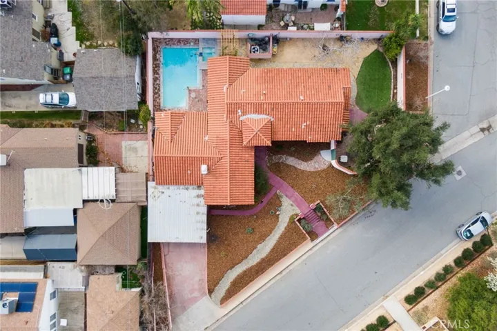 Aerial View: corner lot, street lights, fire hydrants, fully walled side, back & pool yards, pool & spa, Spanish tile roof, xeriscape landscaping in front, side & back yards, mature oak tree, long & wide driveway, 2+Car carport.

Aerial View: corner lot, street lights, fire hydrants, fully walled side, back & pool yards, pool & spa, Spanish tile roof, xeriscape landscaping in front, side & back yards, mature oak tree, long & wide driveway, 2+Car carport.