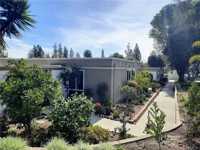 View of community laundry at end of walkway