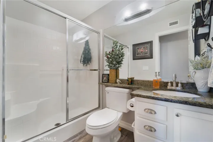 Downstairs full bath with step in shower allows Multi gen living.