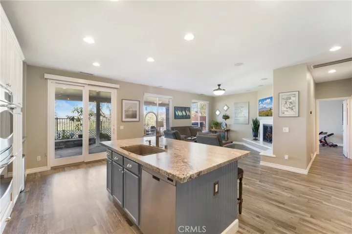Opens to the family room and also out to the backyard.
