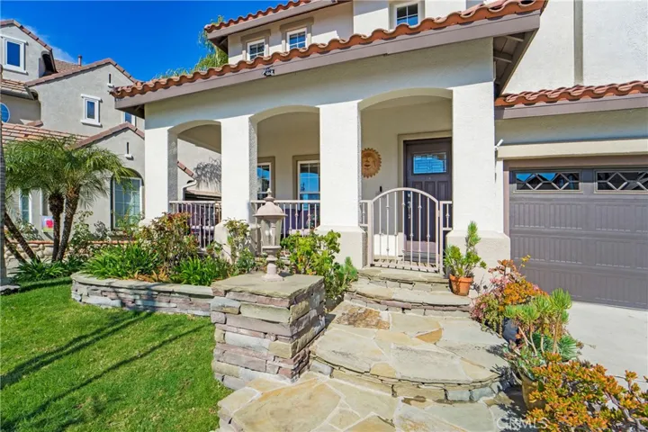  A gated front porch allows for a space for pups to be out front.