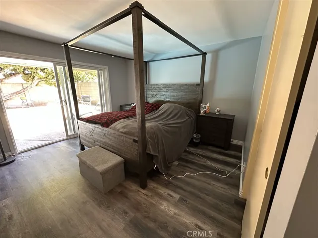 Master Bedroom with Sliding Patio Door to Backyard