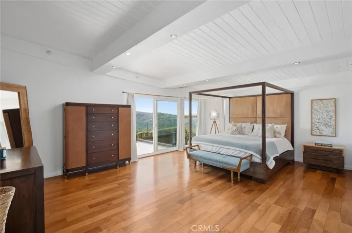Primary suite with direct patio access to soak in the views