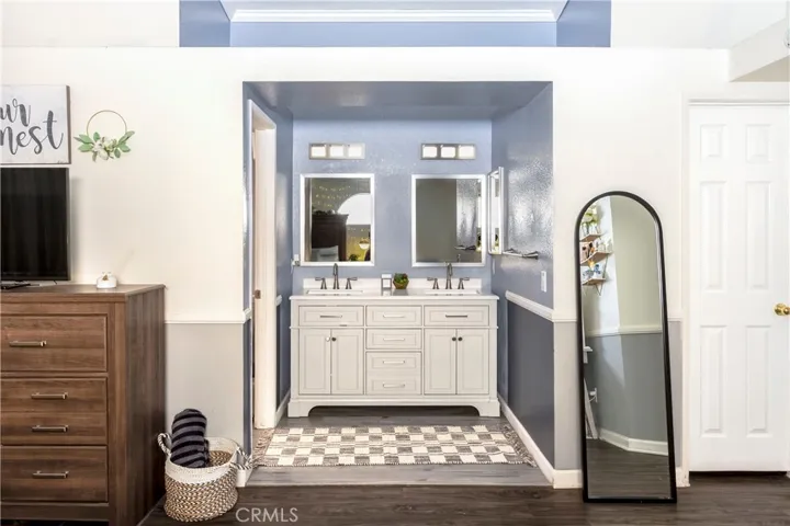 Bathroom vanity in primary bedroom