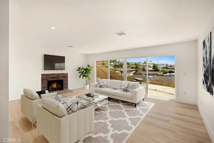 Home is virtually staged including fire in the fireplace, appliance, furniture, and more.  and photographs have been edited buyer to do own due diligence