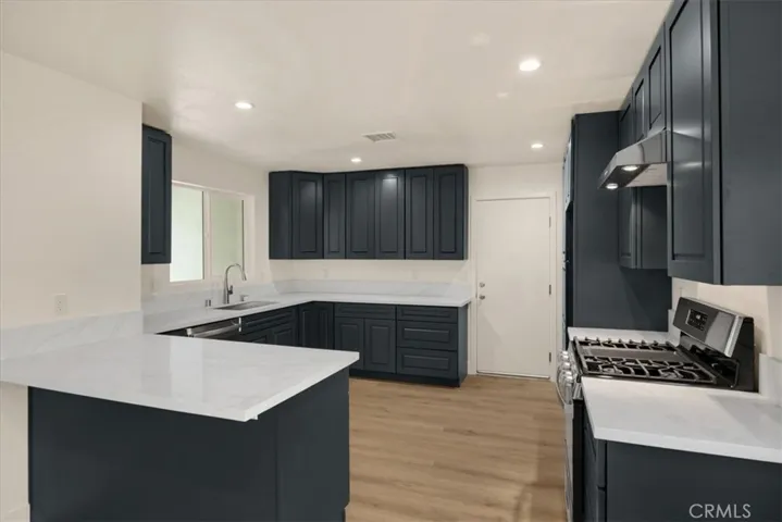 Home is virtually staged including fire in the fireplace, appliance, furniture, and more.  and photographs have been edited buyer to do own due diligence
