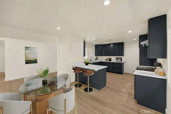 Home is virtually staged including fire in the fireplace, appliance, furniture, and more.  and photographs have been edited buyer to do own due diligence