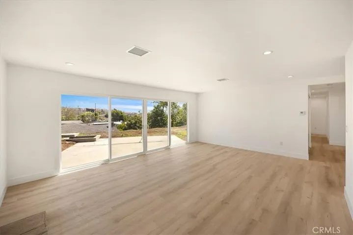 Home is virtually staged including fire in the fireplace, appliance, furniture, and more.  and photographs have been edited buyer to do own due diligence