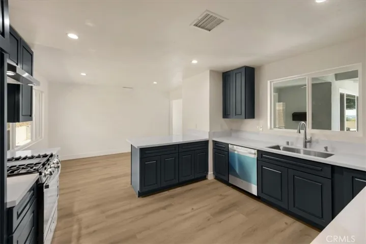 Home is virtually staged including fire in the fireplace, appliance, furniture, and more.  and photographs have been edited buyer to do own due diligence