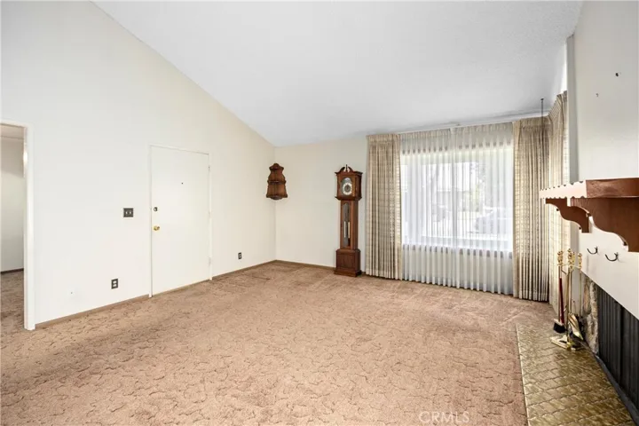 High Ceiling,  Views from the front of the house, and cozy fireplace.