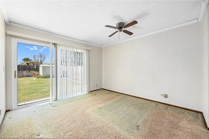 Primary Bedroom with slider to backyard