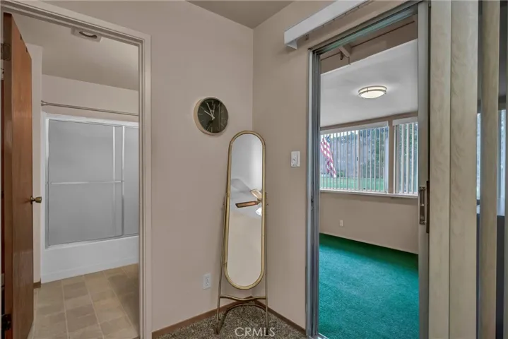 entrance to covered back patio from primary