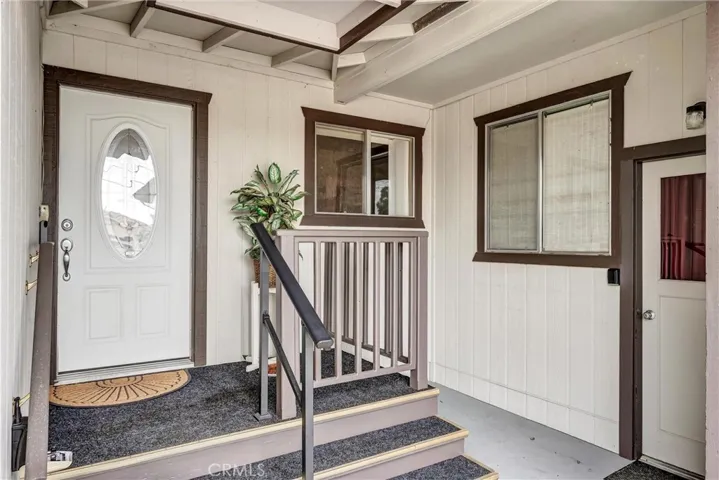 Covered breezeway between garage, workshop and home