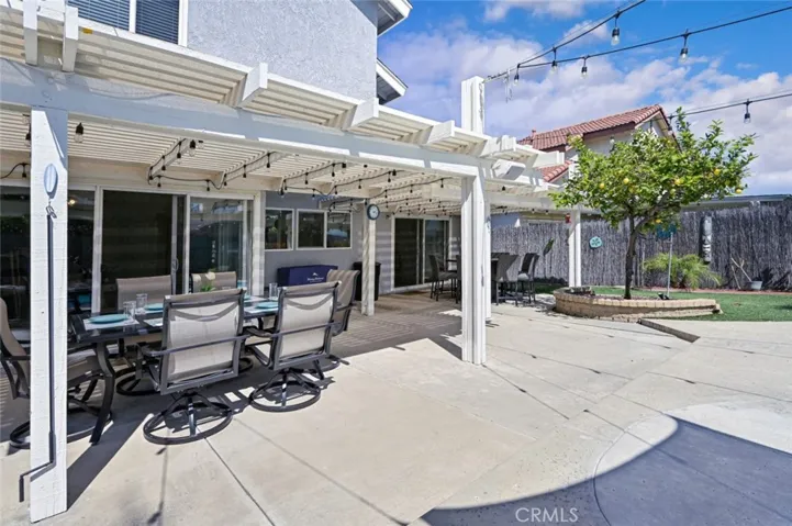 The patio cover was rebuilt and painted.  There is a section of easy to maintain turf next to the lemon tree.