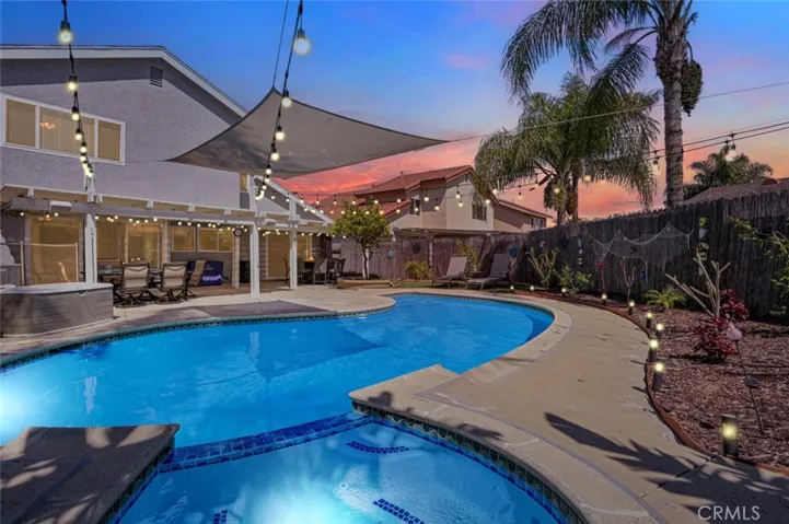 The backyard is a True Oasis with its tropical landscaping.