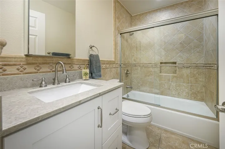 Upstairs Hallway Bathroom has a tub / shower combo and new vanity with quartz countertop