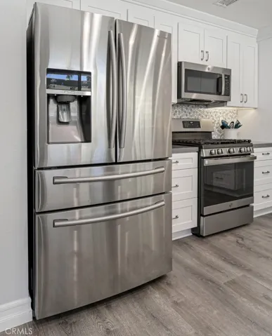 Stainless Steel appliances in this beautiful kitchen.