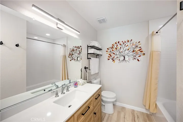 Second primary bathroom. Completely renovated with bathtub.