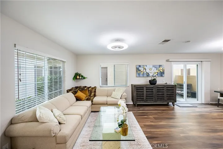 Newer windows and sliding glass door to the patio