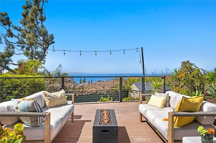 Breathtaking ocean and sunset views and the timeless appeal of single-story living embellish this spacious home in Laguna Beach’s desirable Top of the World enclave.