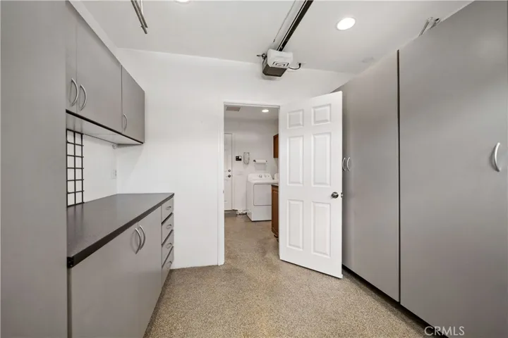 3rd space in garage converted to work space w more storage