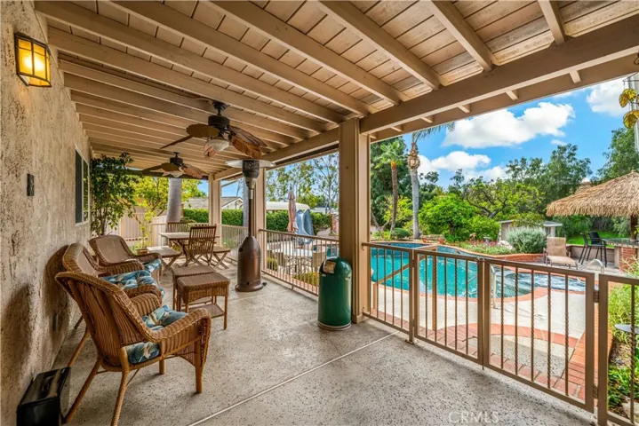 View from rear sliders to back patio and pool area