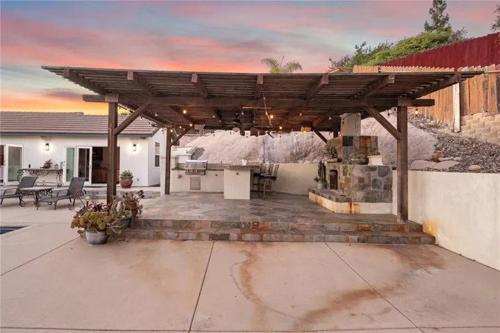 Covered Built-in fire place and BBQ area