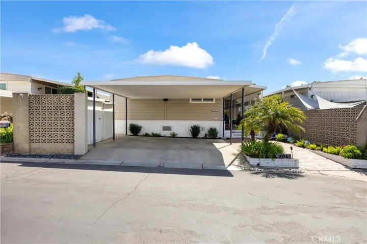 Side by Side 2 Car Carport + 2 Sheds
