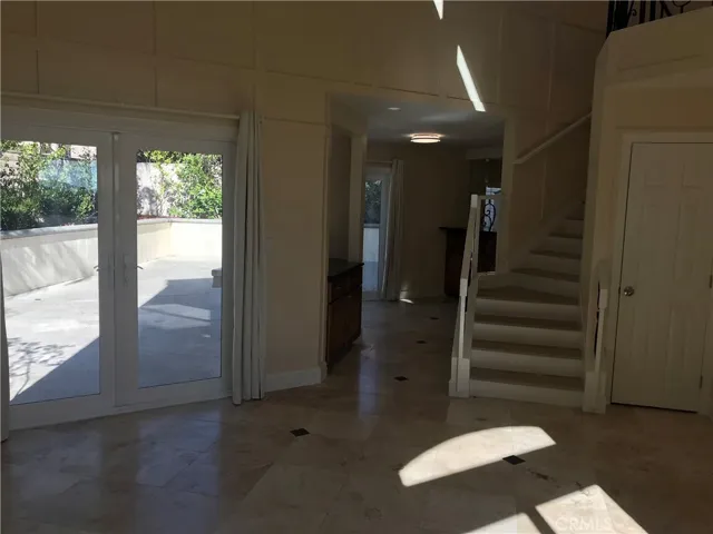 From the Living Room you can be led to the outdoors, Kitchen & Dining area or upstairs!