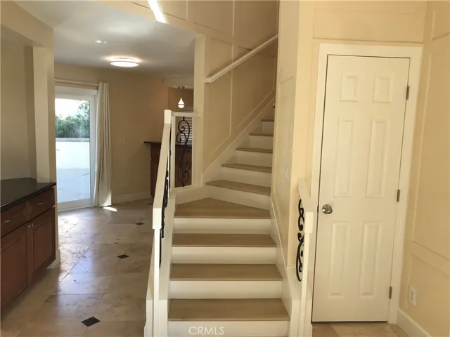 Stylish White-Oak Flooring up the grand Stairway and upstairs!