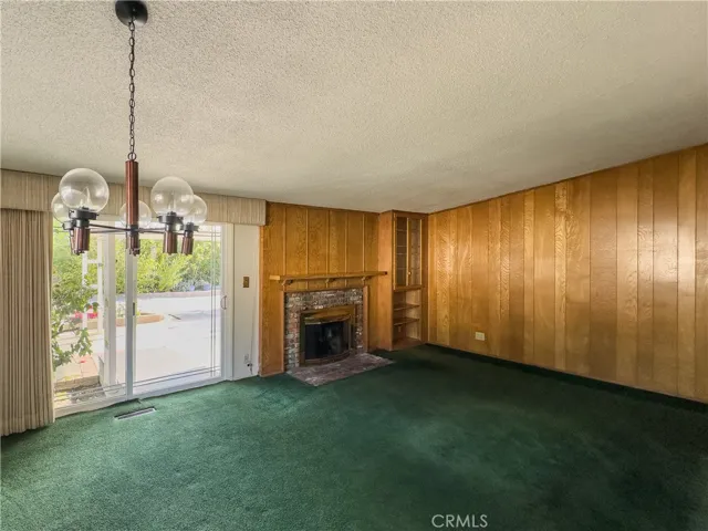 Living Room and Dining Area with Fireplace
